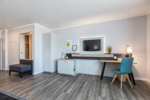 TV a/nebo společenská místnost v ubytování Holiday Inn Düsseldorf-Neuss by IHG