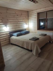 Postel nebo postele na pokoji v ubytování У Мирослави