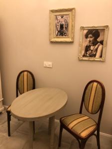Posedenie v ubytovaní All In Apartman IV.