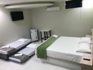 Foto da galeria de HOTEL E POUSADA ISIS em São Pedro mais 28 fotos