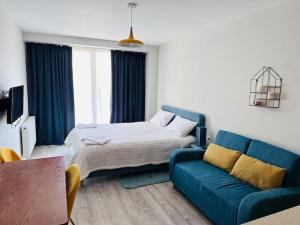 Ліжко або ліжка в номері Gudauri New Gudauri Loft 1