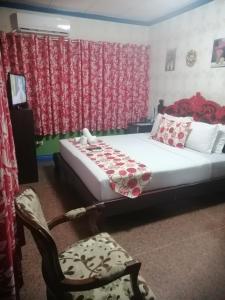 Letto o letti in una camera di Sang Yoo Mountain View Tagaytay Bed and Breakfast - Taal Lake View