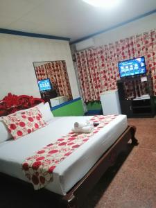 Letto o letti in una camera di Sang Yoo Mountain View Tagaytay Bed and Breakfast - Taal Lake View