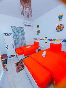 Кровать или кровати в номере Lawanda Nubian B&B +55 фотографий