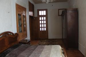 Una cama o camas en una habitación de Guest House Zaira