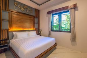 Postel nebo postele na pokoji v ubytování Loy Chalet