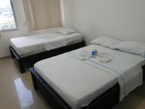 Ένα ή περισσότερα κρεβάτια σε δωμάτιο στο San pedro suite