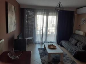 Posedenie v ubytovaní Εclectic Apartment 8fr (free parking)