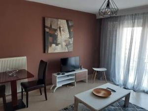Posedenie v ubytovaní Εclectic Apartment 8fr (free parking) + 2 fotografie