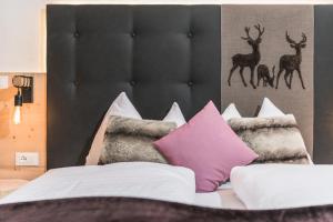 Letto o letti in una camera di Sonnleitn