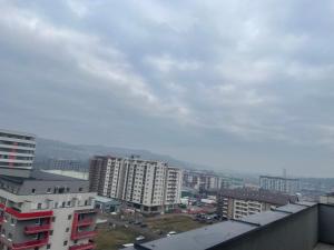 a view of a city with tall buildings at Apartament Cluj in Floreşti
