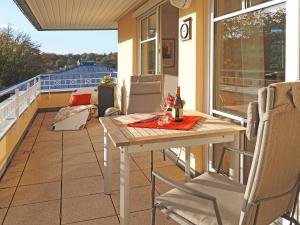 Balkón nebo terasa v ubytování Kaiservillen Heringsdorf - Ferienwohnung mit 1 Schlafzimmer und Balkon C24 + 3 fotografie