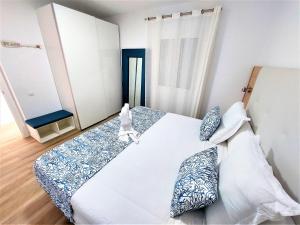 Postel nebo postele na pokoji v ubytování Palmera Azul