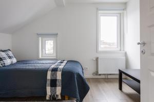 Postel nebo postele na pokoji v ubytování Flores 3