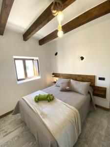 A bed or beds in a room at Ikigai Még 36 kép