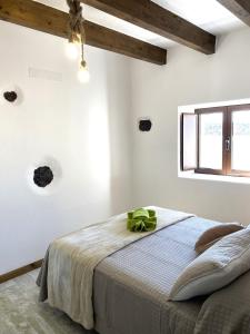 A bed or beds in a room at Ikigai