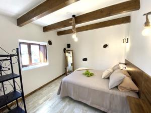 A bed or beds in a room at Ikigai