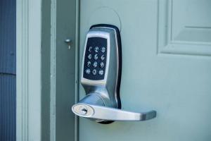 a cell phone is attached to a door at Tiny House close to the Beaches of Cape Charles in Cape Charles