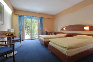 Katil atau katil-katil dalam bilik di Hotel Břízky
