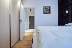 Posteľ alebo postele v izbe v ubytovaní The Gatsby Apartment