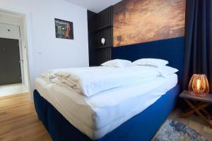 Posteľ alebo postele v izbe v ubytovaní The Gatsby Apartment