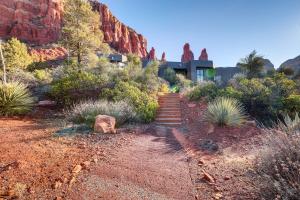 a house in a canyon with a bunch of plants at Sedona Studio with Amazing View and On-Site Hiking! in Sedona