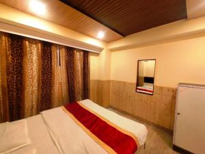 En eller flere senger på et rom på Shorya Regency Near Mall Road Shimla