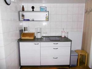 a kitchen with a counter with a blender on it at Ruegen_Fewo 42 in Rambin