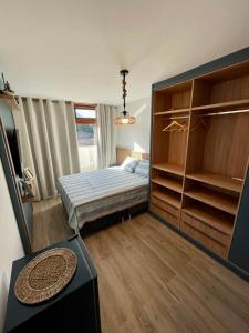 Postel nebo postele na pokoji v ubytování Apartamento 126 - Village Viva Barra + 20 fotografií