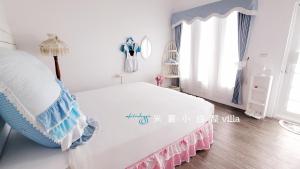 Cama o camas de una habitación en Whitiedoggie Villa II