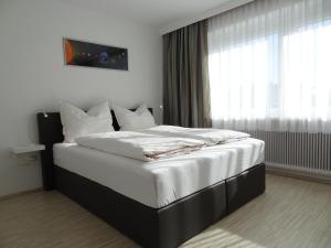 A bed or beds in a room at Holiday flat, Axams