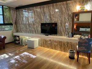 TV a/nebo společenská místnost v ubytování Dream Forest Villa