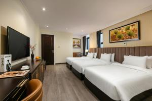 TV a/nebo společenská místnost v ubytování San Palace Hotel & Spa
