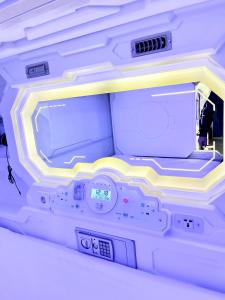 an inside view of an electronic device with a clock at Space Home Apartment - Prater in Vienna