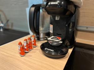 a coffee pot sitting on top of a counter at PETiT MULHOUSE 201 in Mulhouse +49 photos
