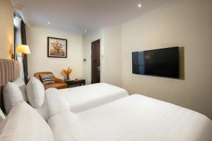 TV a/nebo společenská místnost v ubytování San Palace Hotel & Spa