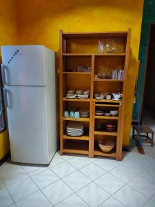 A cozinha ou kitchenette de Casa Minha Backpackers Hostel