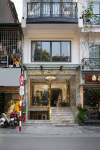 a store front of a building with a window at San Palace Hotel & Spa in Hanoi