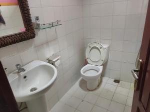 Uma casa de banho em Casa Minha Backpackers Hostel