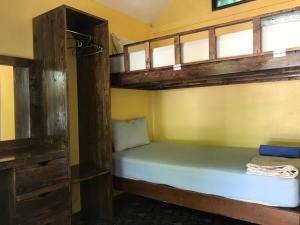 Säng eller sängar i ett rum på Island Lodge