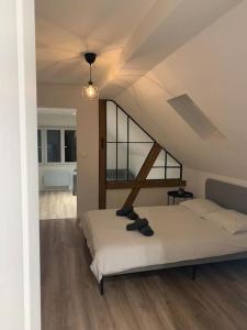 Posteľ alebo postele v izbe v ubytovaní Cute apartment near Colmar