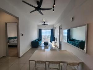 a large living room with a table and chairs at Praicon Tower - Premium Suite in Butterworth