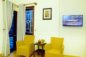 TV a/nebo společenská místnost v ubytování An Hoi Town Homestay