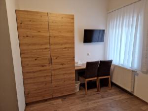 Televízia a/alebo spoločenská miestnosť v ubytovaní Appartement Sami