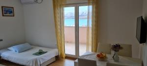 Apartments Zakarija客房内的一张或多张床位
