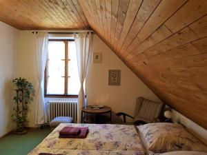 Postel nebo postele na pokoji v ubytování Chalupa pod strání
