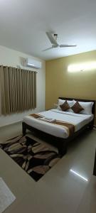 Bulande Comforts-Service Apartment ITPL Whitefield 객실 침대