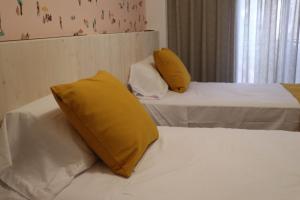 Posteľ alebo postele v izbe v ubytovaní 101 I Posada del Mar I Encantador hostel en la playa de Gandia