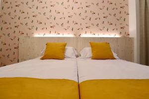 Posteľ alebo postele v izbe v ubytovaní 101 I Posada del Mar I Encantador hostel en la playa de Gandia