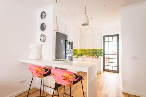 Kuchyň nebo kuchyňský kout v ubytování Eva Boutique Apartment